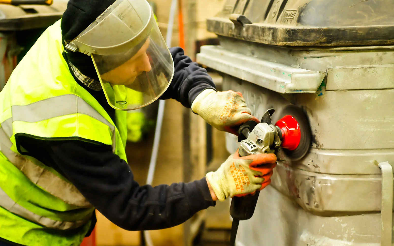 Waste management services including container refurbishment