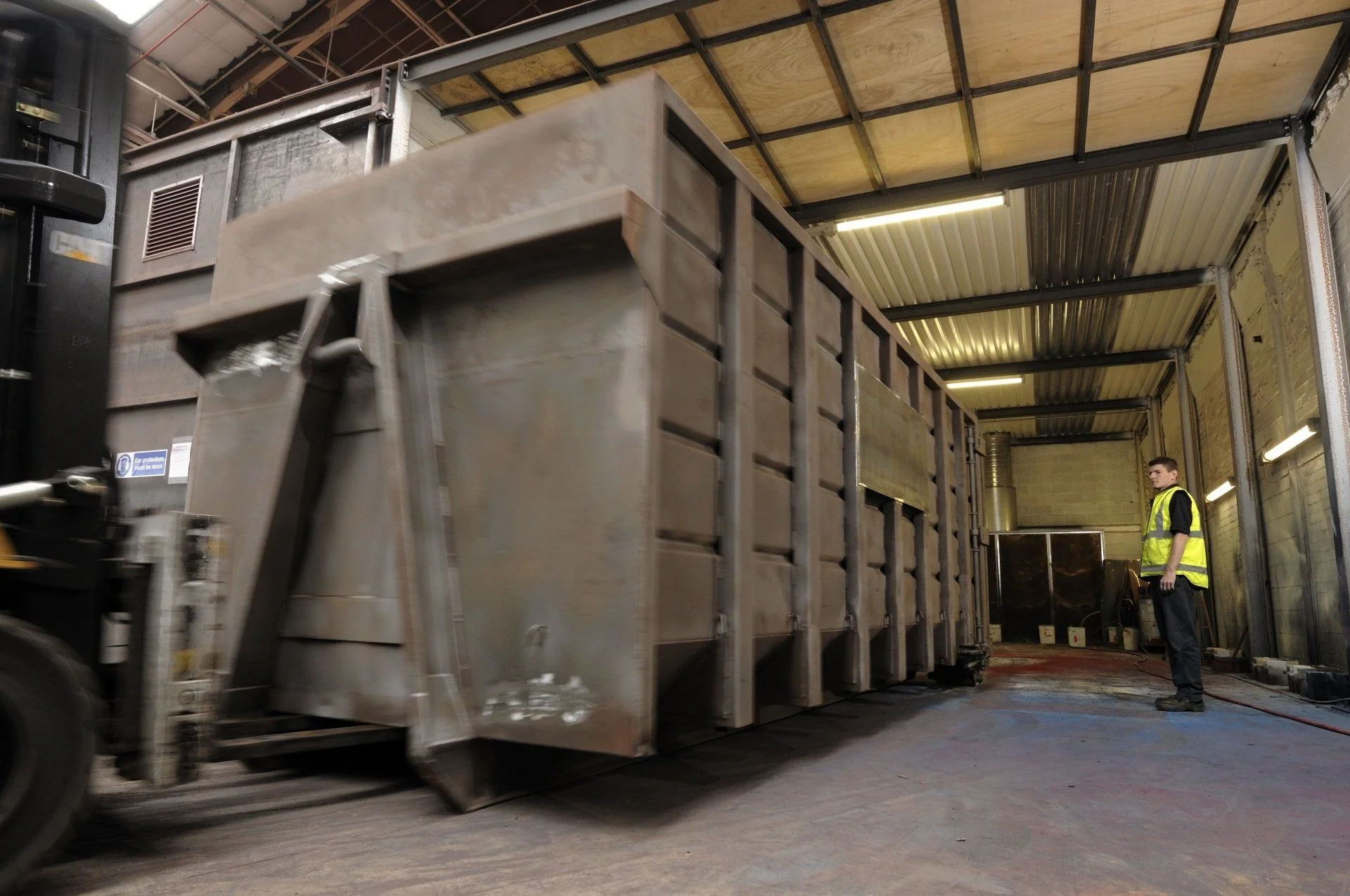 A large container inside the UKCM refurbishment plant