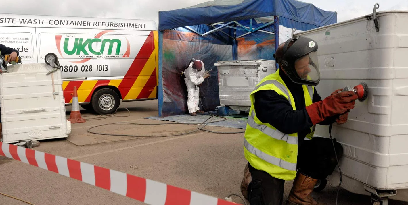 A UKCM engineer repairing a container on site